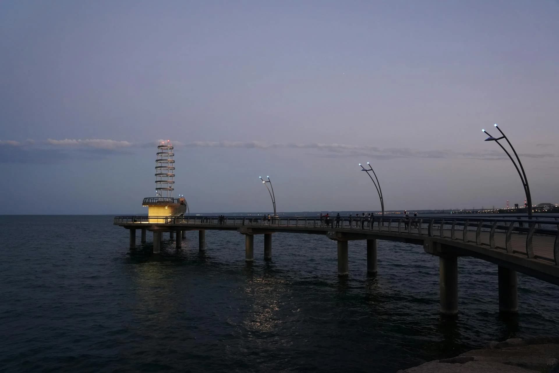 Brant Street Pier extending into Lake Ontario at twilight in Burlington