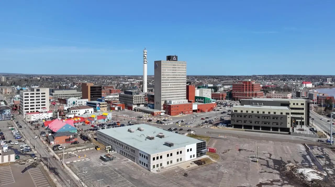 Moncton, New Brunswick downtown with Petitcodiac River — cobbler and shoe repair service area